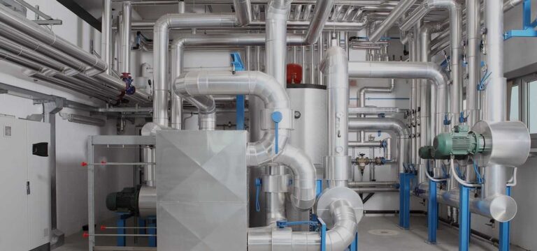 Industrial HVAC system with metal ductwork and piping installation