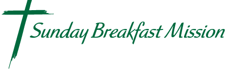 Sunday Breakfast Mission logo with green cross and italicized text